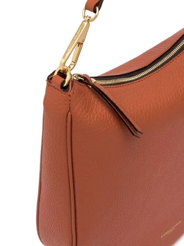 Gianni Chiarini handtas oranje